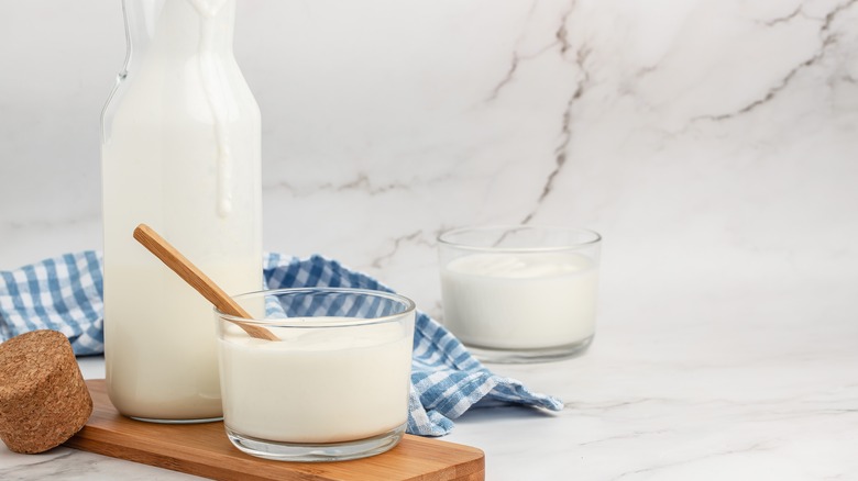 Buttermilk with glasses and marble background