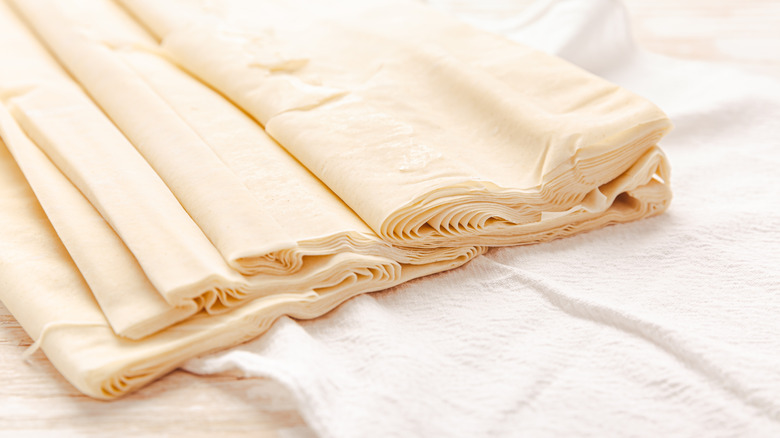 Raw phyllo dough on table