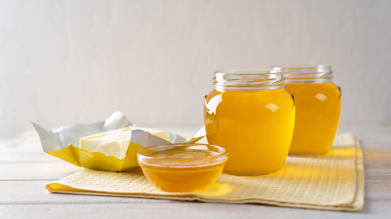 Hot ghee in glass jars