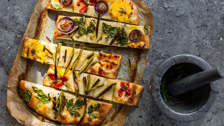 Vegan pizza with herbs