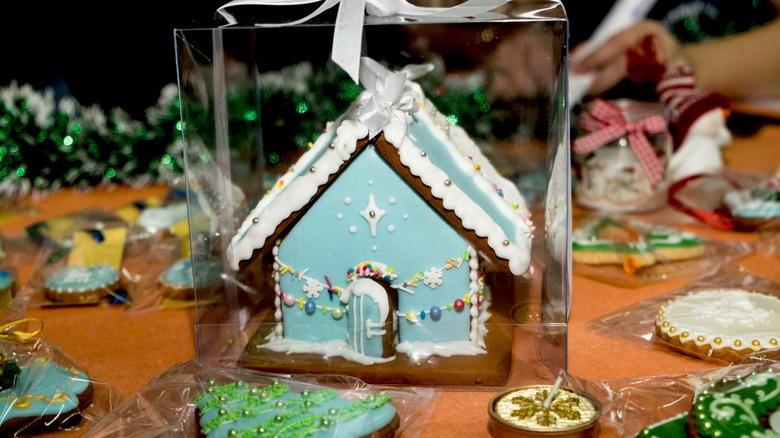 Gingerbread house with decorations in a transparent package