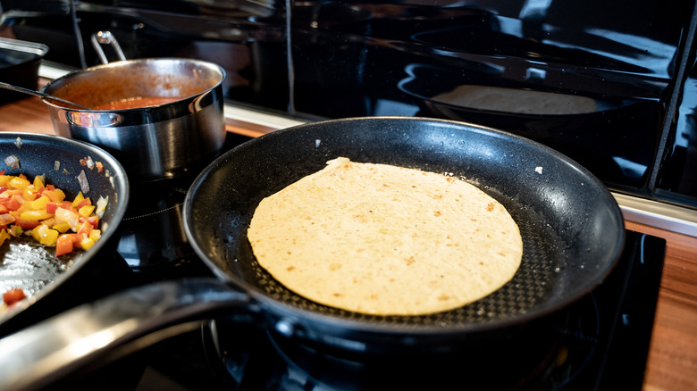 Homemade tortilla in pan