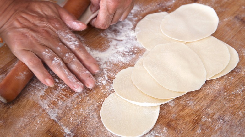 Rolling out dumpling wrappers