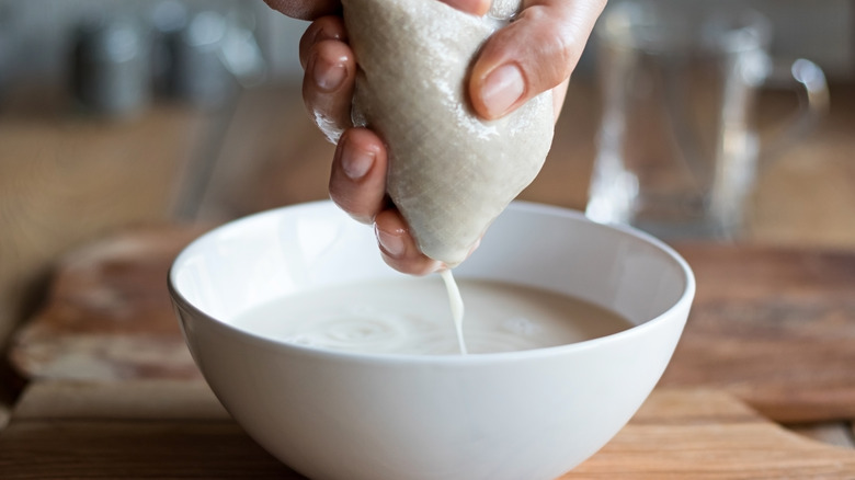 straining creamer into bowl