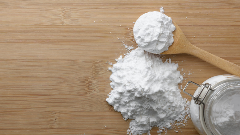 cornstarch with wooden spoon