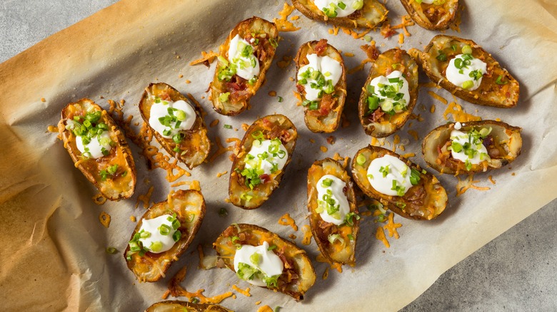 Loaded potato skins on pan