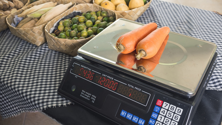 Weighing produce on scale