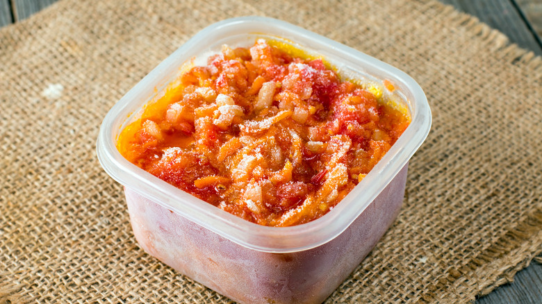 Frozen container tomato leftovers