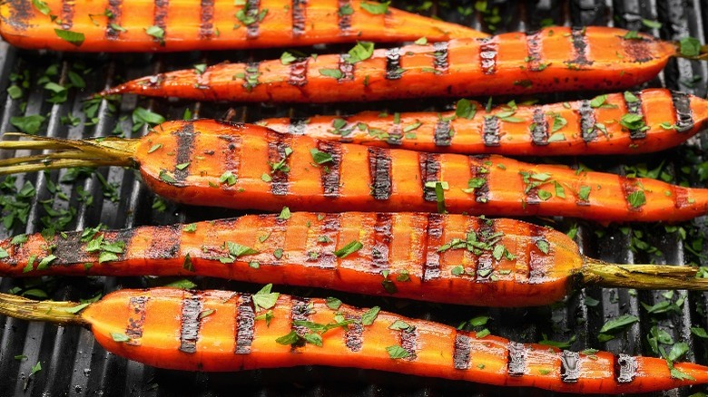 cooked carrots on a grill