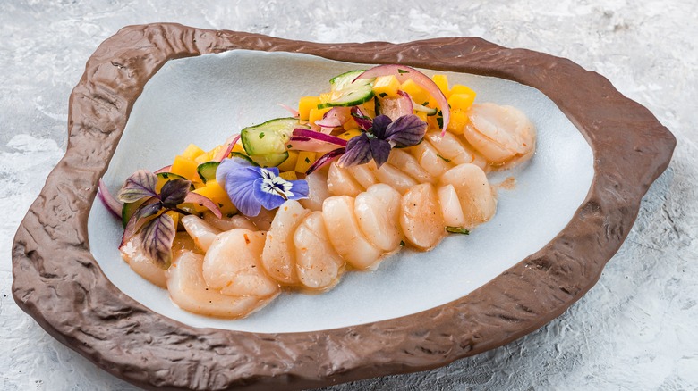 scallop ceviche with decorative flowers