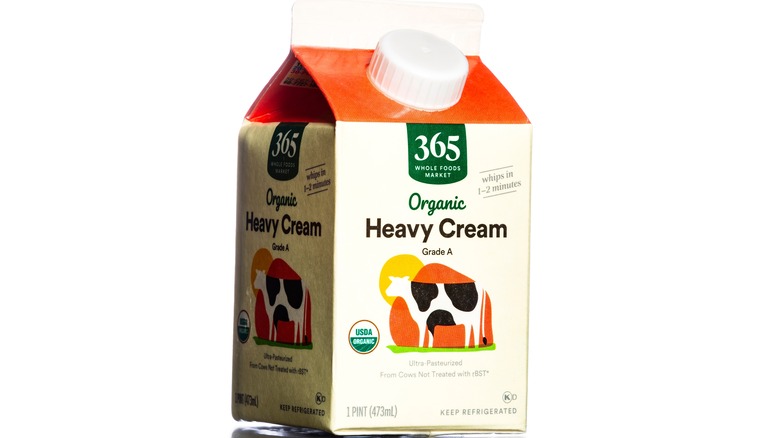 Heavy cream pint on white background