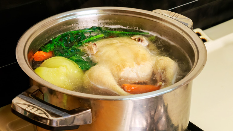 simmering pot of chicken broth