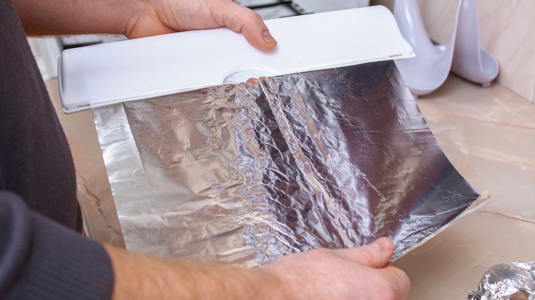 Pulling out tin foil