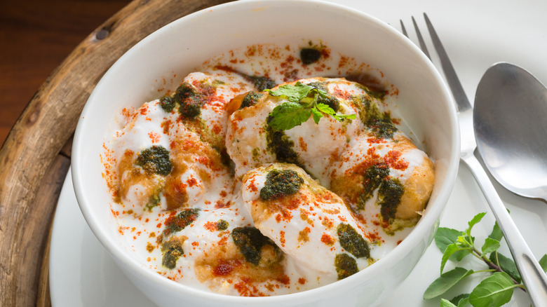 Dahi vada in white bowl