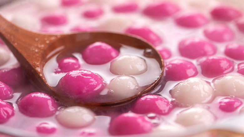 Multicolored tang yuan in soup