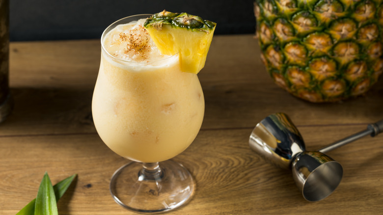 painkiller cocktail garnished with pineapple