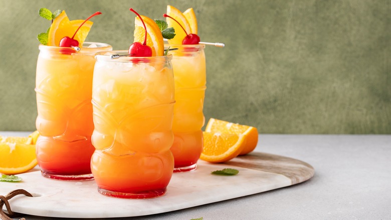 rum punch in tiki glasses