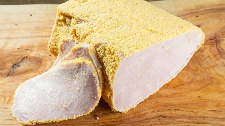 Peameal bacon on cutting board