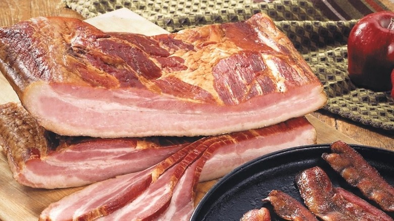 Slab bacon on cutting board