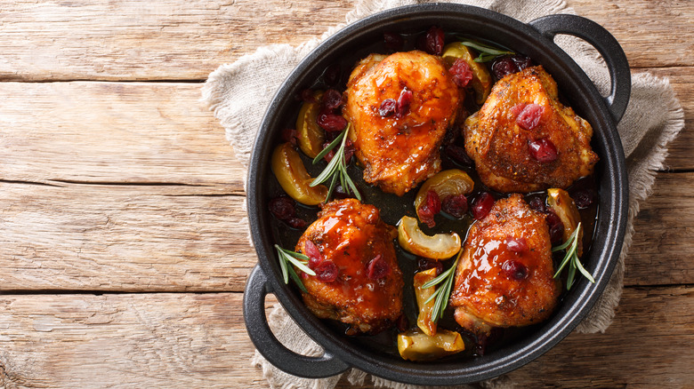 Chicken thighs in a pan