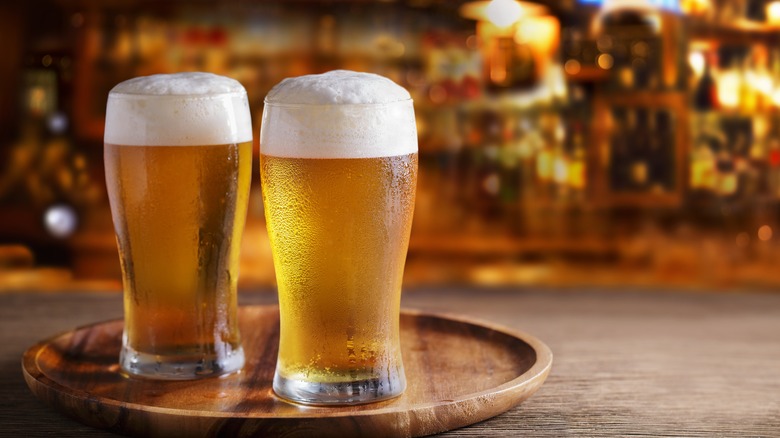 cold beer mugs on table