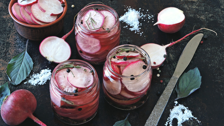 Three jars of pickled radishes