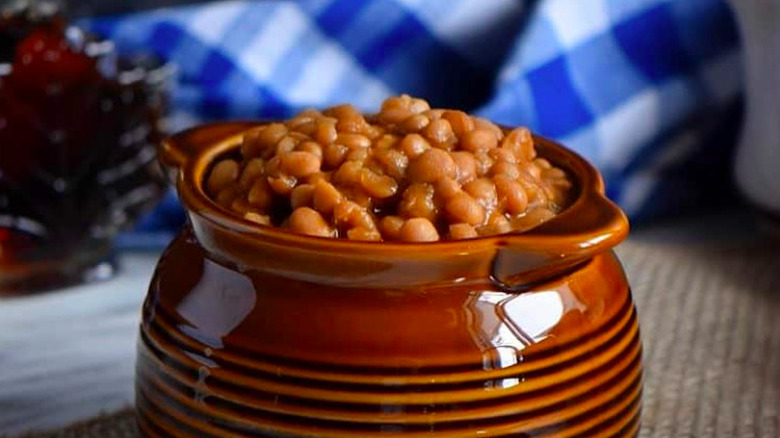 Baked beans in crock with maple jar