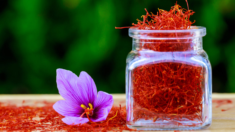 Glass jar filled with saffron stems