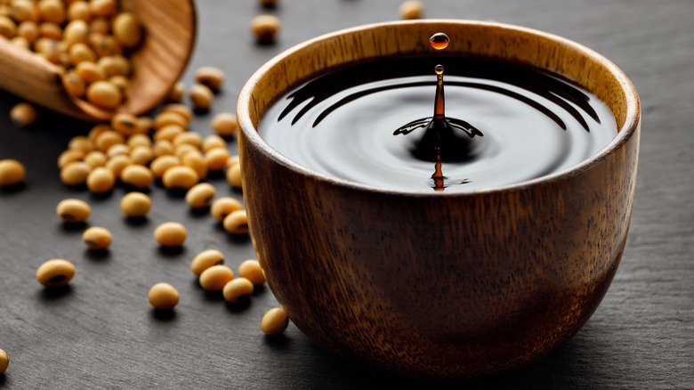 Wooden bowl of soy sauce 
