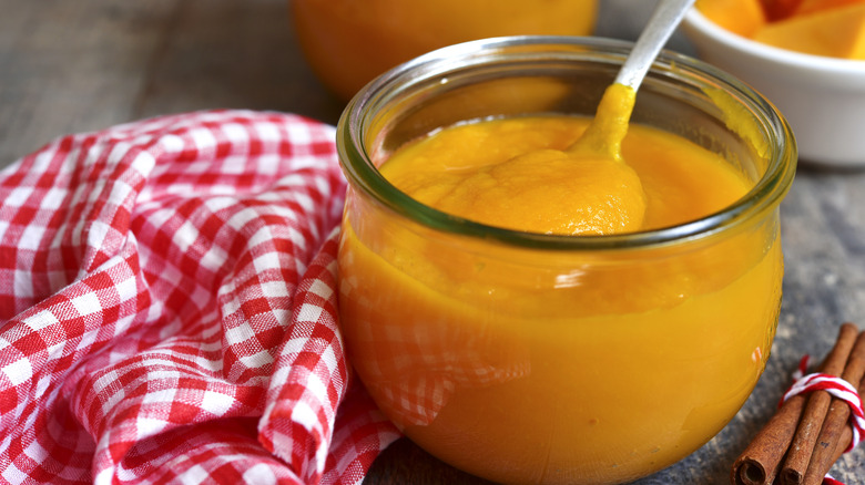 Pumpkin with spoon in jar