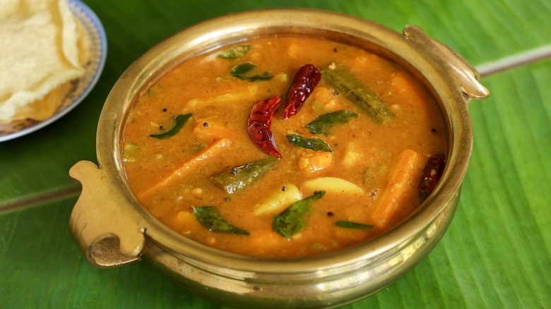 Indian curry with green banana