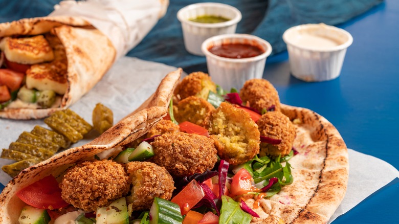 Falafel pita with assorted sauces 