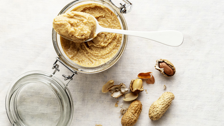 peanut butter glass jar spoon