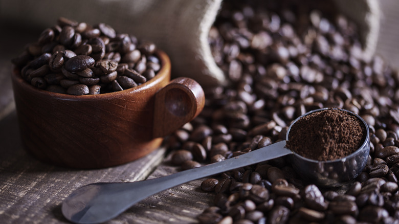 coffee beans spoon with grounds