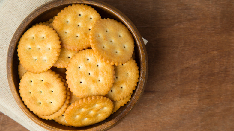 Round butter crackers in bowl