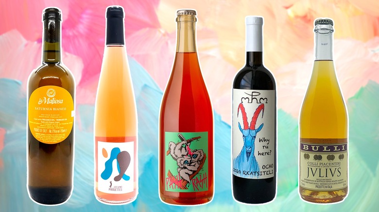 Five colorful wine bottles