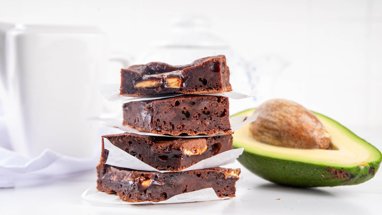 Avocado brownies with halved avocado