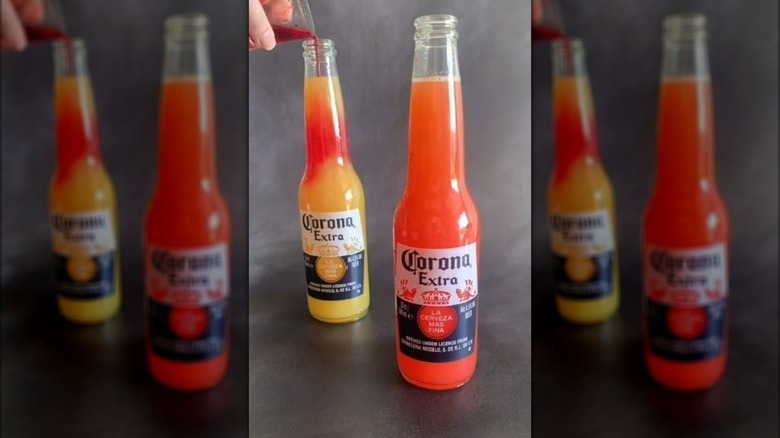 Making Corona sunrise cocktails