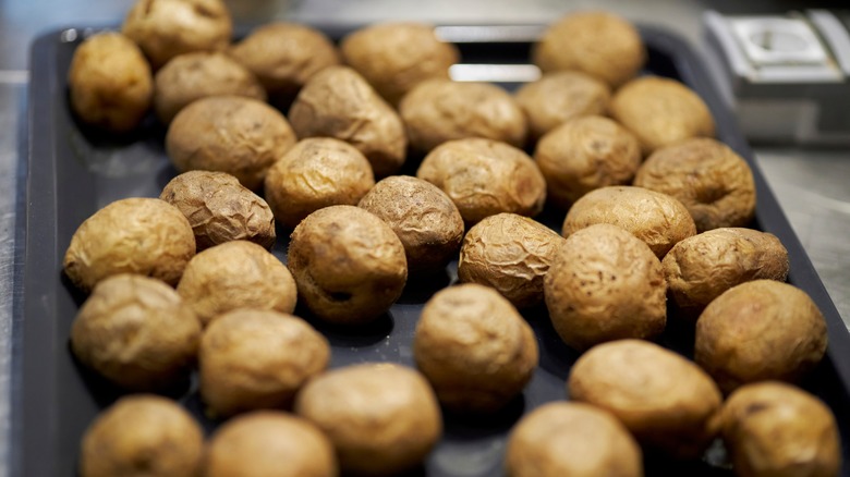 Potatoes on baking sheet