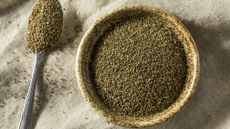 Spoon and bowl of celery seeds