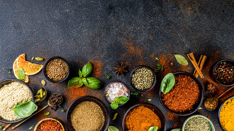 spices whole ground black background