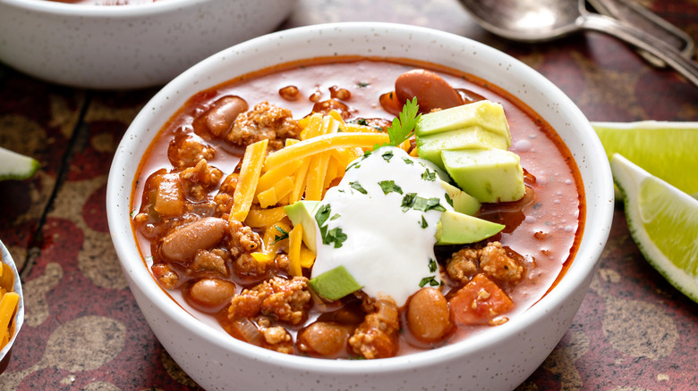 chili with cheese cream avocado