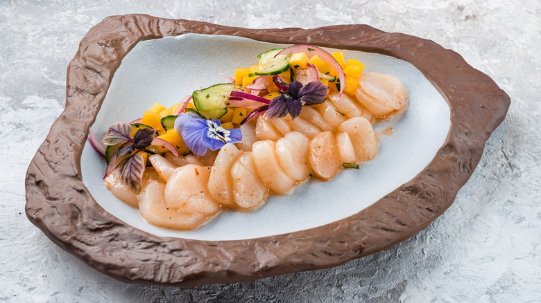 scallops with vegetables and flowers