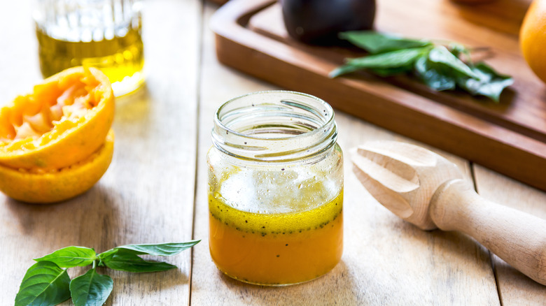 Salad dressing jar on table