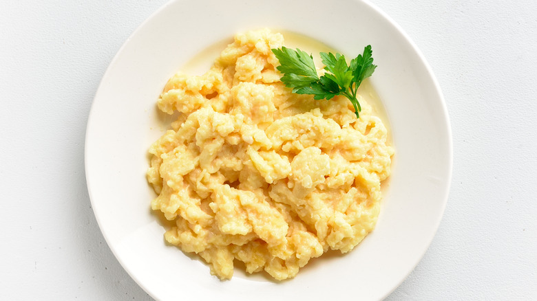 Soft scrambled eggs in bowl