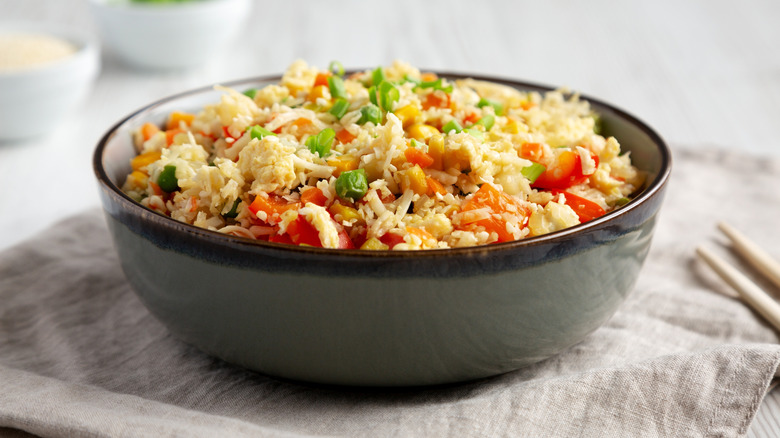 Fried cauliflower rice with veggies in bowl