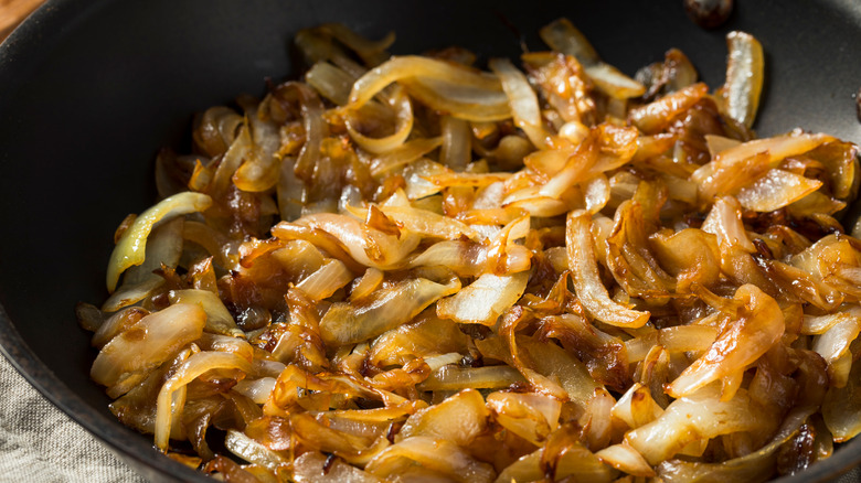 Homemade caramelized onions in pan