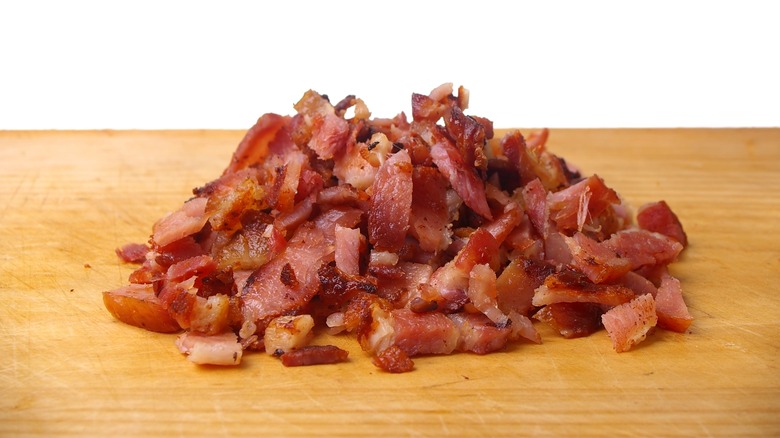 Bacon and pancetta on chopping board