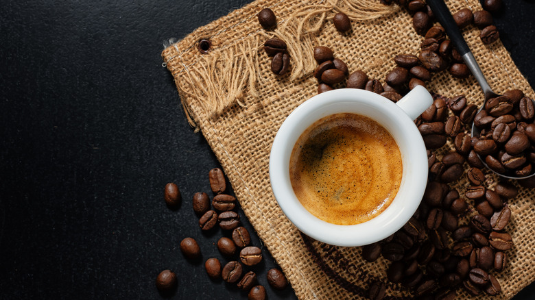 espresso shot and coffee beans