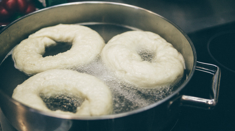 Bagels poaching in water